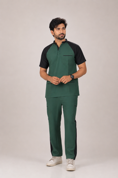 Man wearing a green and black outfit on a plain background